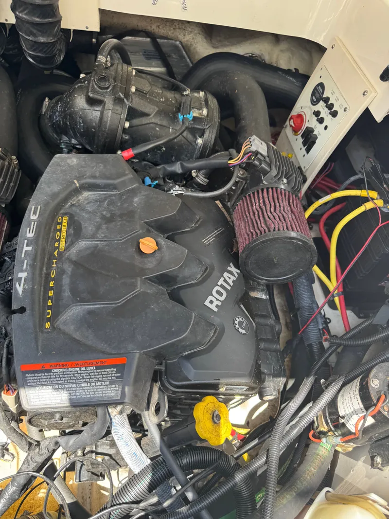 Slide: The Image of Engine compartment of a 2017 Chaparral 243VRX with a Rotax engine. - 42