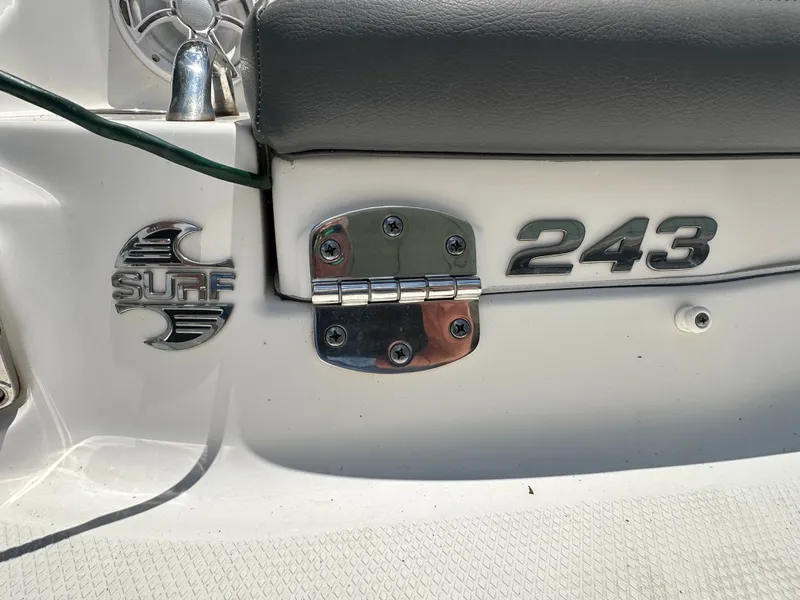 Slide: The Image of Close-up of a Chaparral 243VRX boat with surf logo and hinge. - 45
