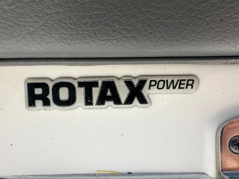 Slide: The Image of Rotax Power logo on a boat. - 46