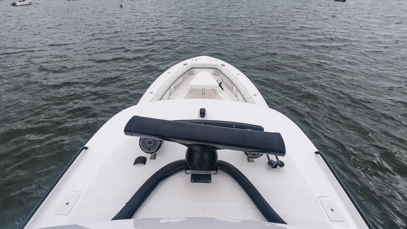 Slide: The Image of Bow view of 2017 Everglades 435 CC boat on water. - 37