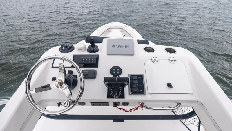 Slide: The Image of Helm of 2017 Everglades 435 CC boat with Garmin navigation system. - 40