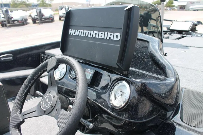 Slide: The Image of Dashboard of 2025 Phoenix 920 Elite boat with Humminbird display and gauges. - 5