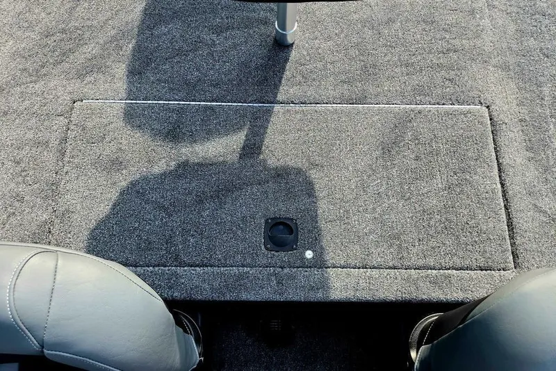 Slide: The Image of Interior view of 2026 Tracker Bass Tracker Classic XL boat with carpeted flooring. - 19