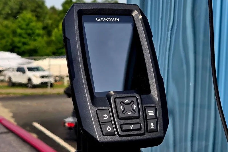 Slide: The Image of Garmin fishfinder on 2026 Tracker Bass Tracker Classic XL boat, outdoor setting. - 10