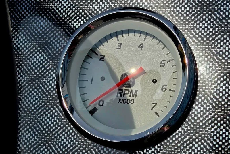 Slide: The Image of Tachometer of 2026 Tracker Bass Tracker Classic XL, displaying RPM on textured background. - 18