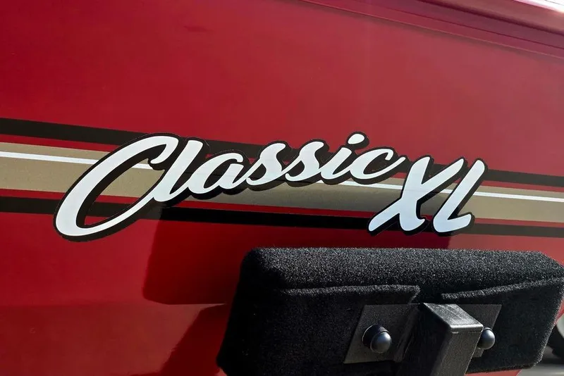 Slide: The Image of 2026 Tracker Bass Tracker Classic XL logo on red background. - 22