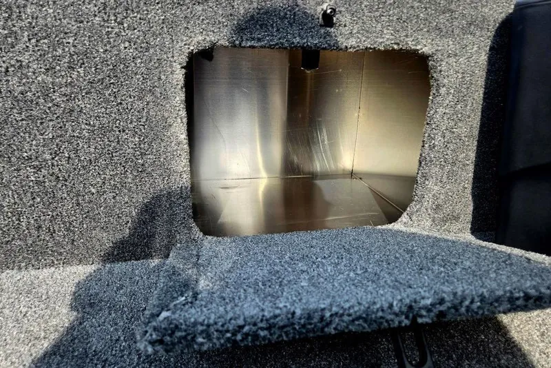 Slide: The Image of Interior storage compartment of 2026 Tracker Bass Tracker Classic XL boat. - 6