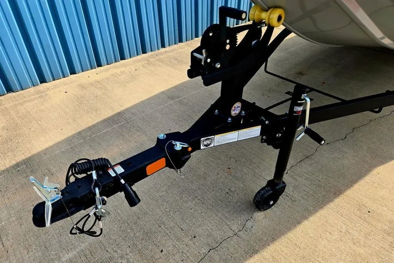 Slide: The Image of Trailer hitch of 2026 Tracker Bass Tracker Classic XL boat on concrete surface. - 25