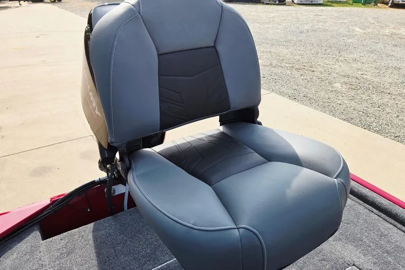 Slide: The Image of 2026 Tracker Bass Tracker Classic XL boat seat, gray upholstery, outdoor setting. - 16