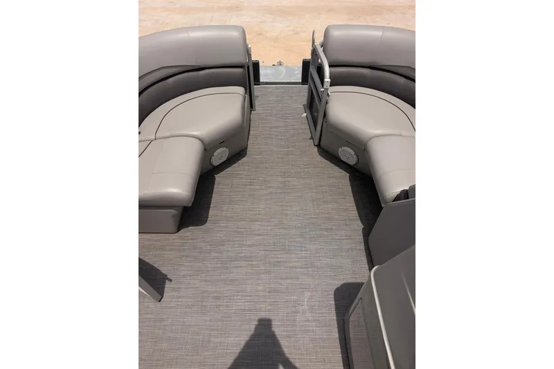 Slide: The Image of Interior view of 2021 Lowe SS 210 pontoon boat with gray seating and flooring. - 12