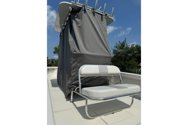 Slide: The Image of 2022 Rambo 27 boat with covered console and cushioned seating. - 7