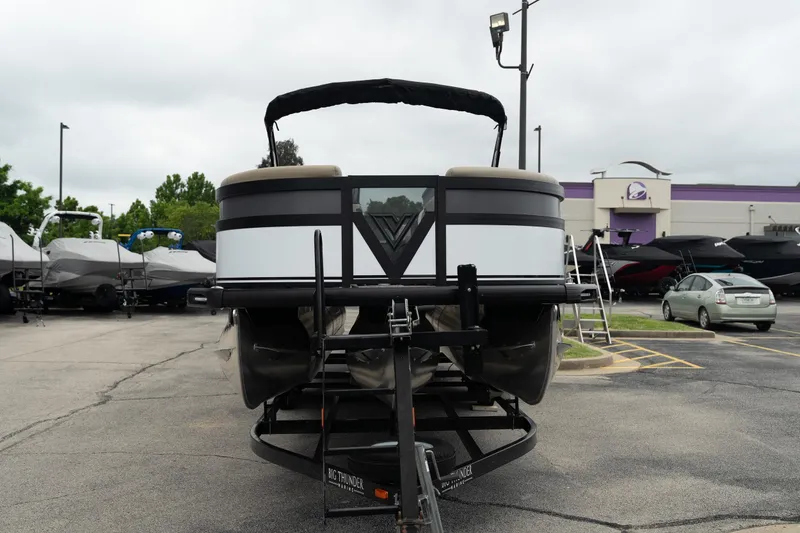 Slide: The Image of 2026 Viaggio Diamante U 26 pontoon boat on trailer in dealership lot. - 10