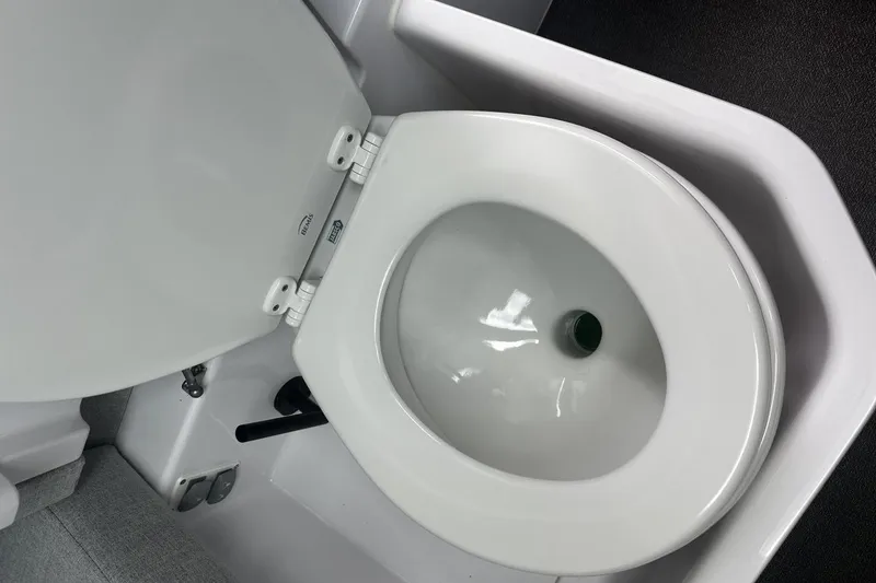 Slide: The Image of 2024 Axopar 37 XC Cross Cabin toilet interior detail. - 10