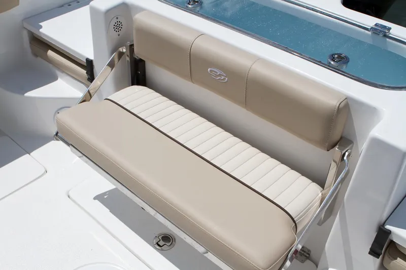 Slide: The Image of Manufacturer Provided Image: 2015 Sea Fox 266 Commander boat with beige cushioned seating. - 11