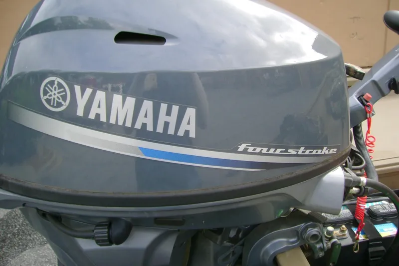 Slide: The Image of Yamaha four-stroke outboard motor on a 2023 G3 1652 DK boat. - 12