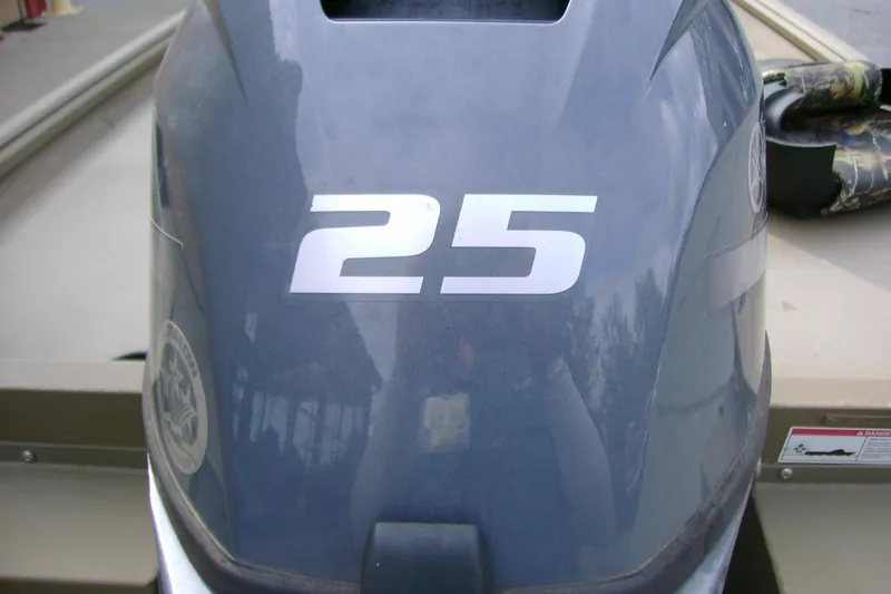 Slide: The Image of Outboard motor with "25" label on a 2023 G3 1652 DK boat. - 5