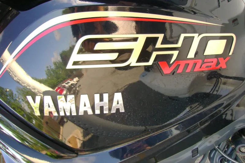 Slide: The Image of Close-up of Yamaha SHO VMAX engine on 2022 NauticStar 227 XTS boat. - 12