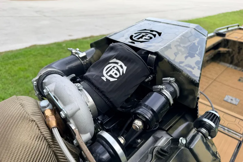 Slide: The Image of Turbocharged engine of 2024 Prodigy 1854 boat, featuring advanced components and sleek design. - 30