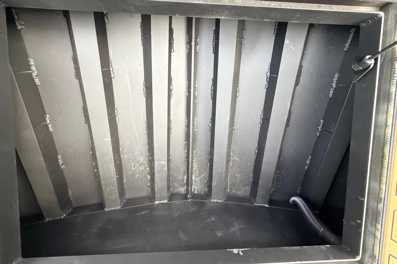Slide: The Image of Interior view of a 2024 Prodigy 1854 model, showcasing its sleek, ribbed design. - 74