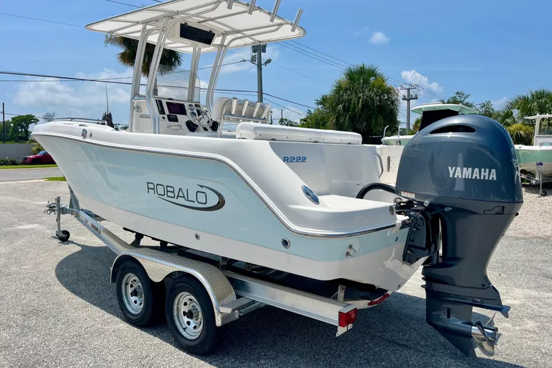 Slide: The Image of 2016 Robalo R222 Center Console boat with Yamaha engine on trailer. - 3