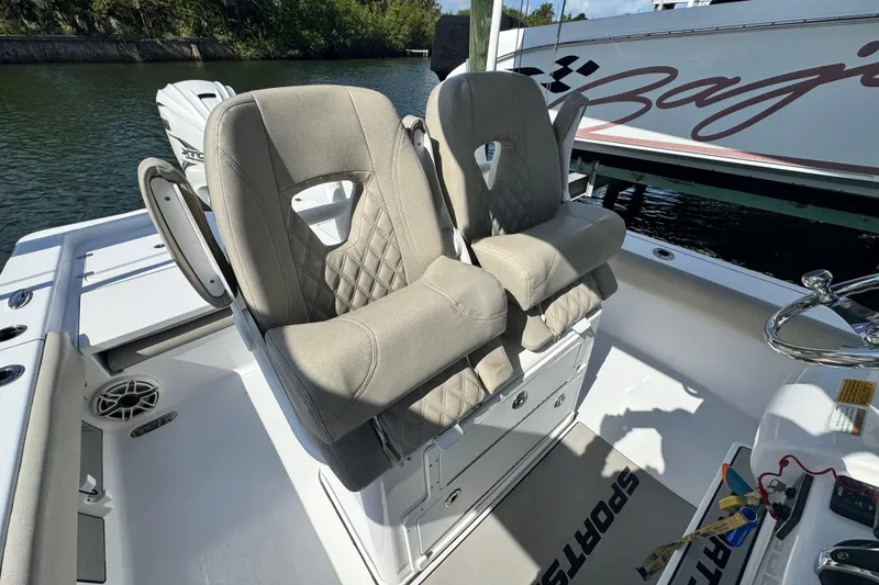 Slide: The Image of 2021 Sportsman Masters 267 Bay Boat with dual cushioned seats and sleek design. - 15