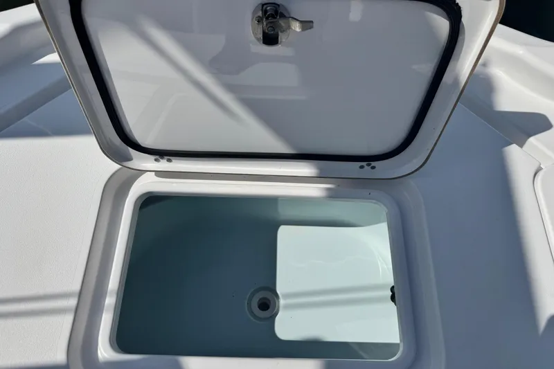Slide: The Image of Open storage compartment on 2021 Sportsman Masters 267 Bay Boat. - 29