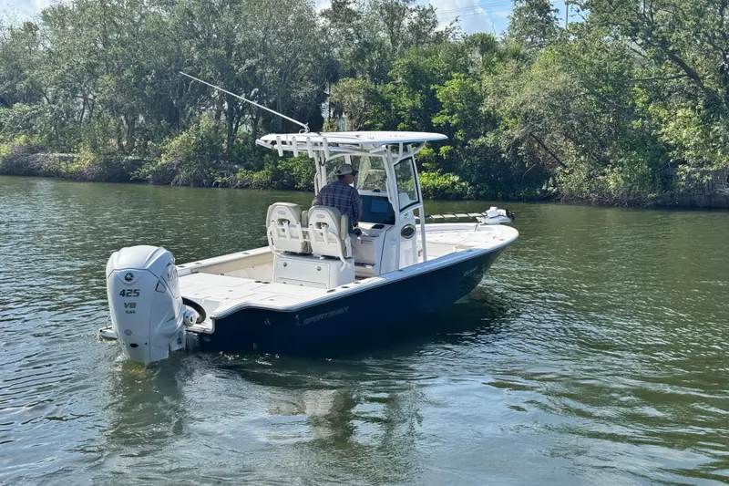 Slide: The Image of 2021 Sportsman Masters 267 Bay Boat cruising on a scenic river. - 3