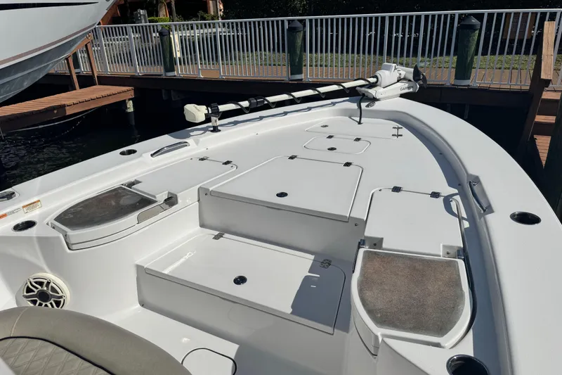Slide: The Image of 2021 Sportsman Masters 267 Bay Boat deck with storage compartments and trolling motor. - 33