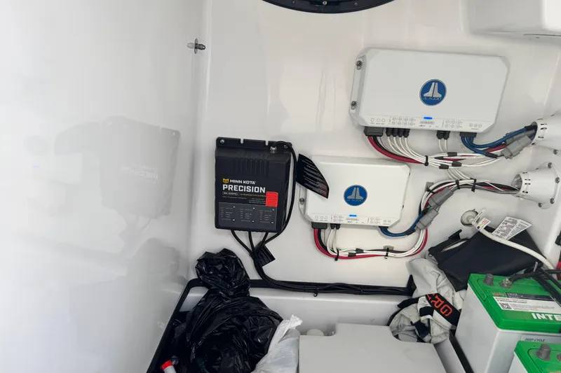 Slide: The Image of 2021 Sportsman Masters 267 Bay Boat electrical system with Minn Kota Precision charger and wiring. - 46