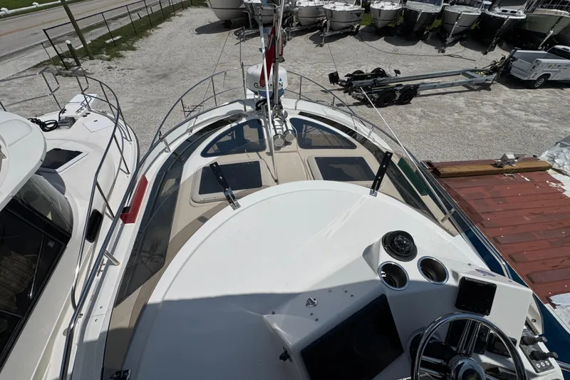 Slide: The Image of 2019 Ranger Tugs R-29 CB boat deck view, showcasing helm and surrounding area. - 45