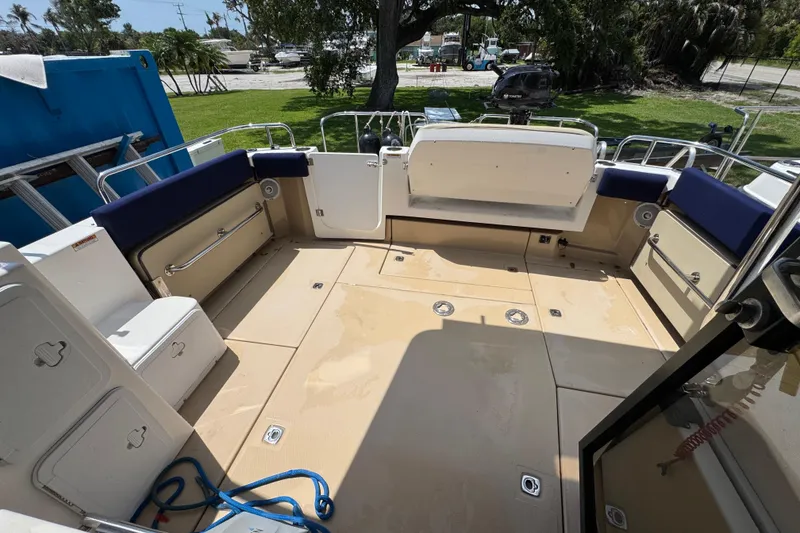 Slide: The Image of 2019 Ranger Tugs R-29 CB boat deck with seating and storage compartments. - 40