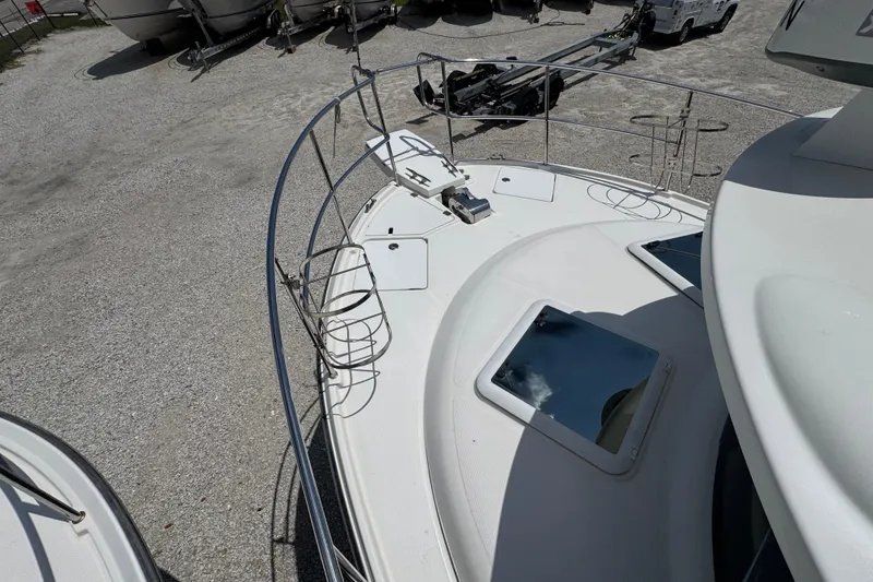 Slide: The Image of 2019 Ranger Tugs R-29 CB boat deck with railings and hatches. - 47