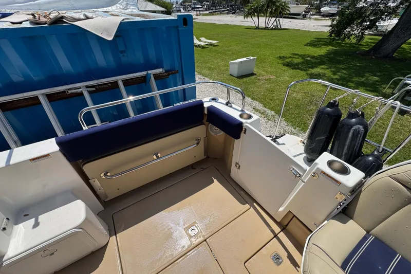 Slide: The Image of 2019 Ranger Tugs R-29 CB boat deck with seating and storage compartments. - 10