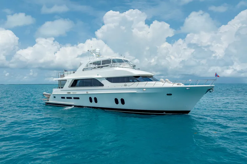 The Image of 2018 Cheoy Lee Bravo 78 Sport Motor Yacht cruising on clear blue ocean. - 0