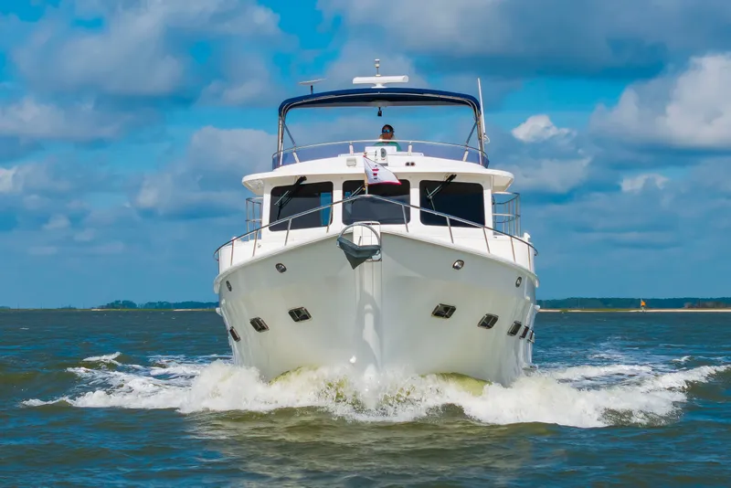 Slide: The Image of 2016 DeFever Euro 52 cruising on the water. - 2