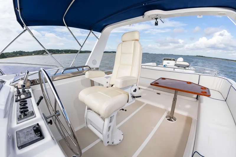Slide: The Image of 2016 DeFever Euro 52 with helm and seating on the water. - 23