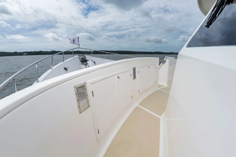 Slide: The Image of The deck of a 2016 DeFever Euro 52 on calm water. - 32