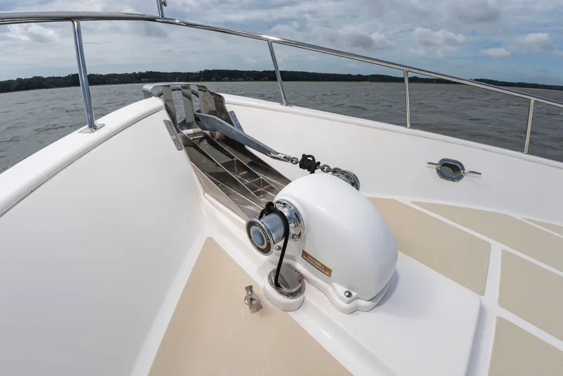 Slide: The Image of Bow of a DeFever Euro 52 with anchor windlass on calm water. - 34