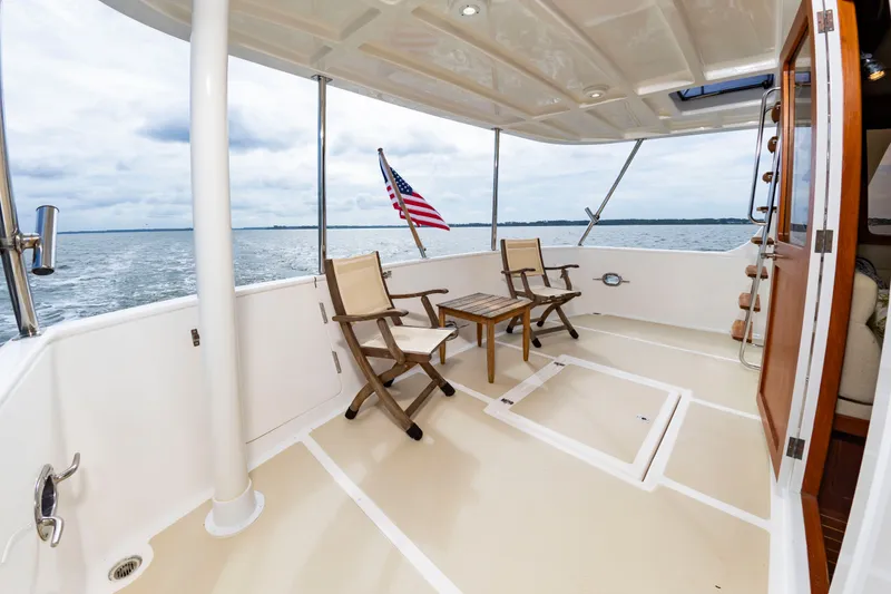 Slide: The Image of 2016 DeFever Euro 52 with spacious deck and seating area. - 36