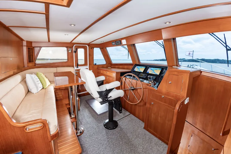 Slide: The Image of Interior of a 2016 DeFever Euro 52 with wood finish and helm station. - 47