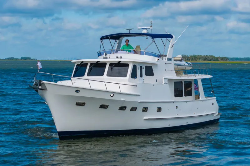Slide: The Image of 2016 DeFever Euro 52 cruising on the water. - 8