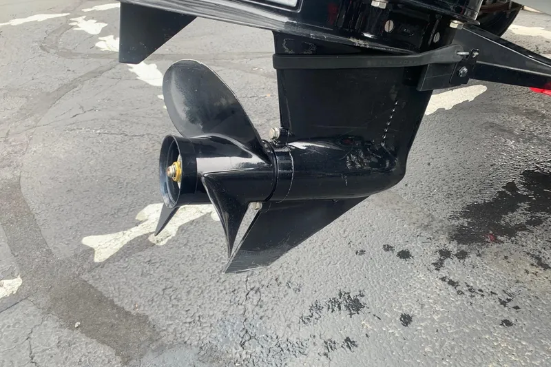 Slide: The Image of 2016 Tracker Pro Team 175 TXW boat propeller on pavement. - 10