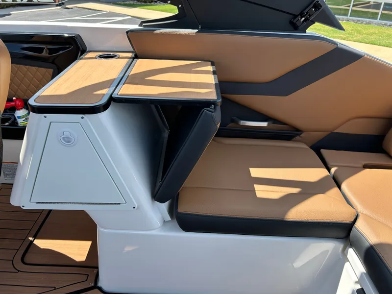 Slide: The Image of The 2026 Yamaha 252SD features a stylish interior with brown and black seating. - 11