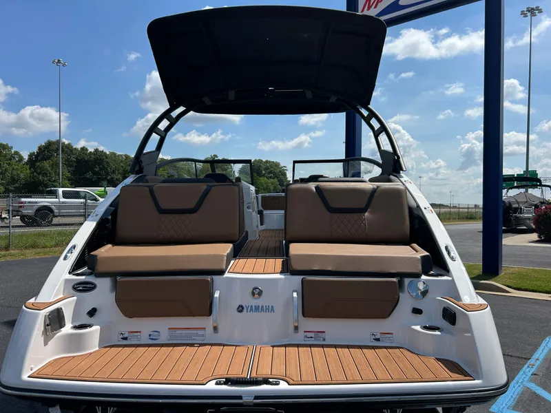 Slide: The Image of The image shows a Yamaha boat, model 252SD, year 2026, with sleek seating and wood accents. - 4