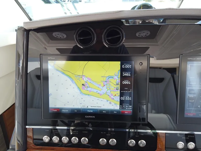 Slide: The Image of Tiara Sport 34LS 2024: Navigation system with map display and controls. - 12