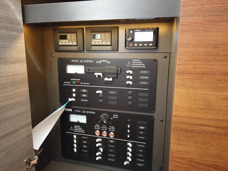 Slide: The Image of Electrical control panel inside the 2024 Tiara Sport 34LS. - 18