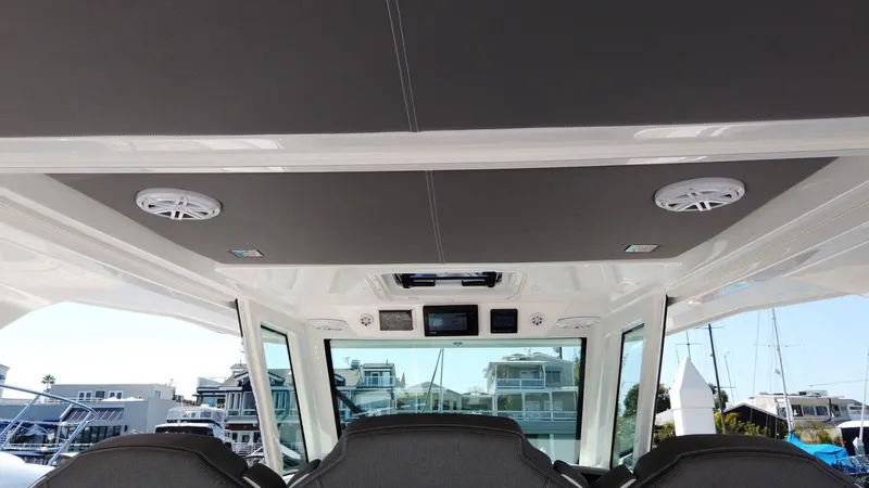 Slide: The Image of Tiara Sport 34LS 2024: Interior view with modern ceiling and speakers. - 26