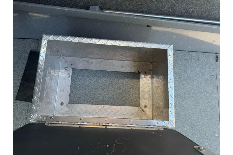 Slide: The Image of Aluminum storage compartment in 2014 River Hawk 19 GB boat interior. - 15