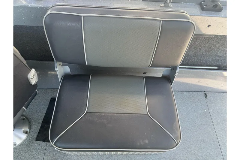 Slide: The Image of Gray and black boat seat in a 2014 River Hawk 19 GB model. - 16