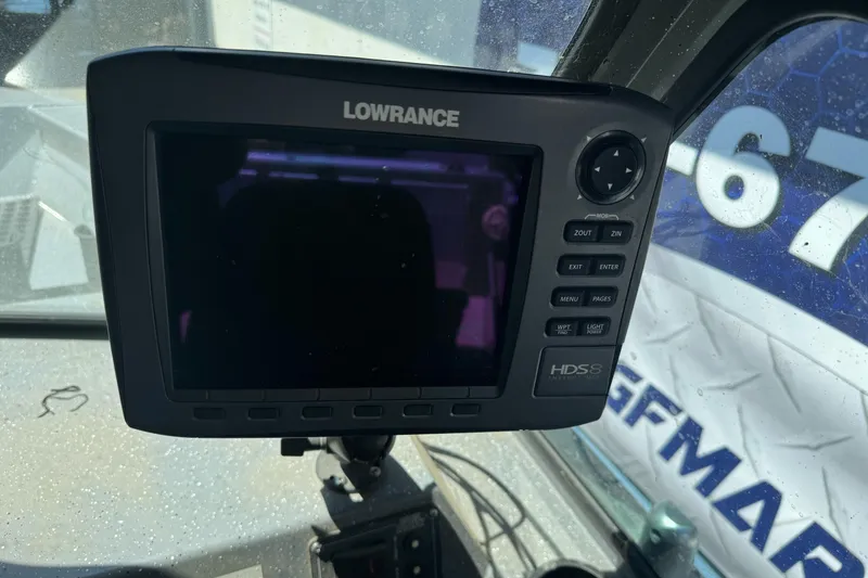 Slide: The Image of Lowrance HDS-8 fishfinder on 2014 River Hawk 19 GB boat dashboard. - 24